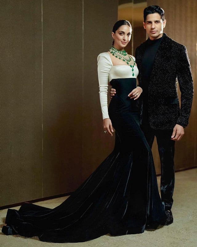 Designer Manish Malhotra captioned this photo of the couple thus: 'The handsome Sidharth Malhotra @sidmalhotra embraces modern edge in our tailor-made suave velvet suit looking every bit the regal royal debonair. The ensemble features a classic turtleneck paired with a velvet blazer hand embroidered and crafted with black crystals and bugel beads with velvet pants... A classic timeless black on black dapper look, pattern cut to perfection.' (Photo | Instagram)