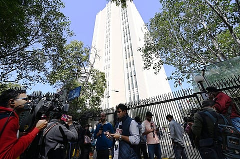 Media personnel outside the BBC office amid a survey operation conducted by Income Tax Department officials as part of a tax evasion investigation, at KG Marg in New Delhi. (Photo | Parveen Negi, EPS)