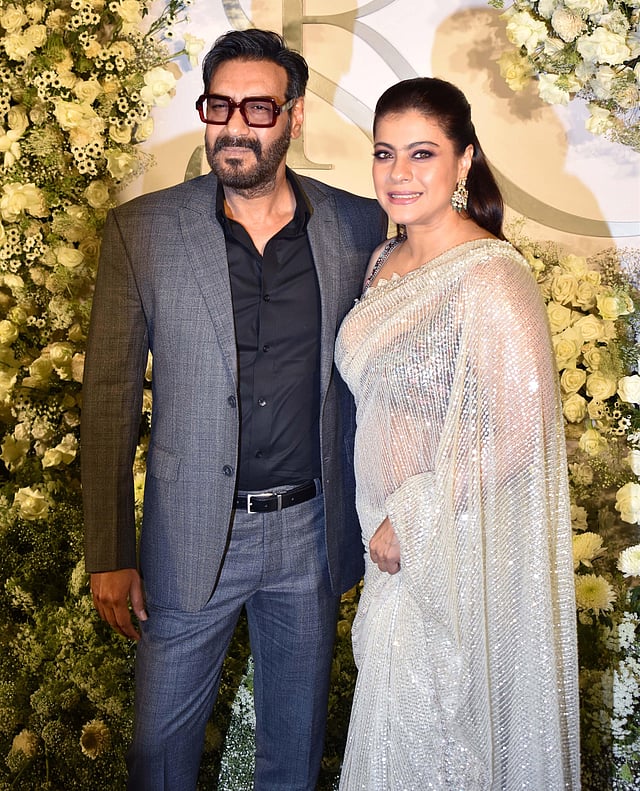 Celebrity couple Ajay Devgn and Kajol at the wedding reception of Sidharth Malhotra and Kiara Advani in Mumbai. (Photo | PTI)