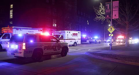 First responders stage outside Berkey Hall on the campus of Michigan State University. (Photo | AP)