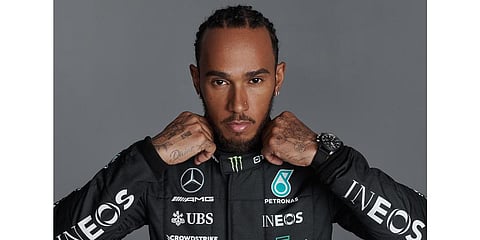 Mercedes AMG F1 driver Lewis Hamiltion in his new team kit for the upcoming F1 season. (Photo |Twitter @MercedesAMGF1)