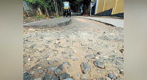 An autorickshaw driver navigates Kalabhavan Mani Road dug up for smart road project in Thiruvananthapuram | B P Deepu