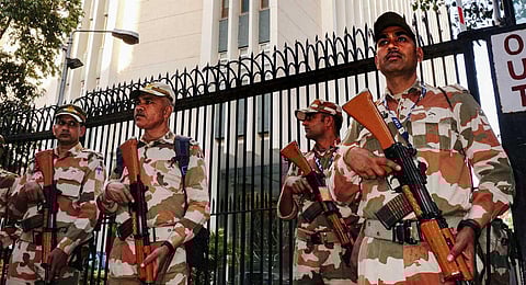 ITBP personnel deployed outside the BBC office after a protest against BBC by Hindu Sena activists amid the Income Tax Department's survey operation in New Delhi, Wednesday, Feb. 15, 2023. (PTI Photo)