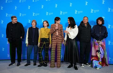 The International Jury of Berlinale: Radu Jude, from left, Valeska Grisebach, Carla Simon, Jury President Kristen Stewart, Golshifteh Farahani, Johnnie To and Francine Maisler. (Photo | AP)
