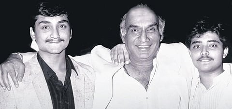 A still from ‘The Romantics’ featuring (L-R) Aditya Chopra, Yash Chopra, Uday Chopra