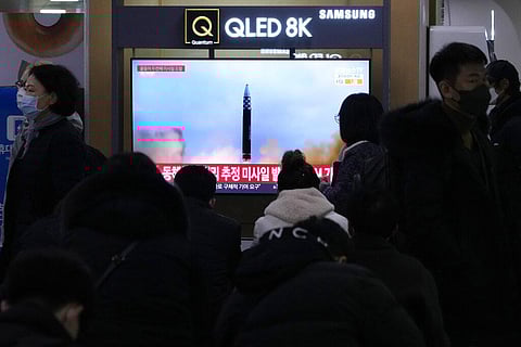 A TV screen shows a file image of North Korea's missile launch during a news program at the Seoul Railway Station in Seoul, South Korea, Saturday, Feb. 18. 2023.  (Photo | AP)