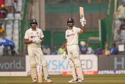Axar Patel raises his bat after scoring a half century during the 2nd day of the 2nd test cricket match between India and Australia in New Delhi, Feb. 18, 2023. (Photo | PTI)