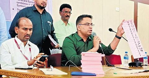 Election officers addressing the media | Express