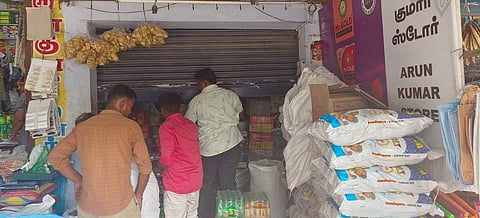 Shopkeepers in Muthuramalingam Thevar daily market