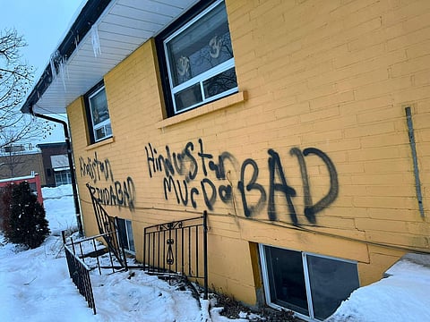 Graffiti depicting anti-India and pro-Khalistani slogans at the vandalised temples. (Photo | Special Arrangement)