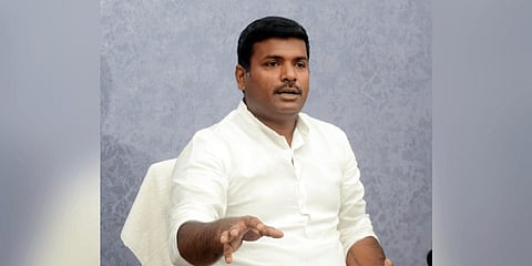 IT Minister Gudivada Amarnath speaking to media person in Visakhapatnam on Wednesday. (Express | G Satyanarayana)