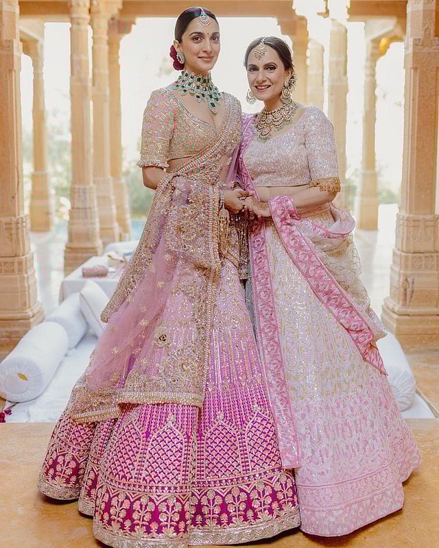 Kiara and her mother Genevieve on her wedding day. Designer Manish Malhotra captioned the photo thus: 'The bride stands out in our exclusive bridal set of natural diamonds and zambian emeralds from our Manish Malhotra high diamond jewellery collection and her mother, Genevieve Advani wearing our Manish Malhotra Uncut jewellery by Raniwala 1881.' (Photo | Manish Malhotra Vows Instagram)