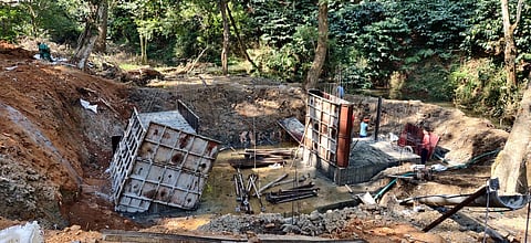 The check dam project across Chikliholey Stream in Kodagu by the Minor Irrigation Department is under construction. (Photo | Special Arrangement)