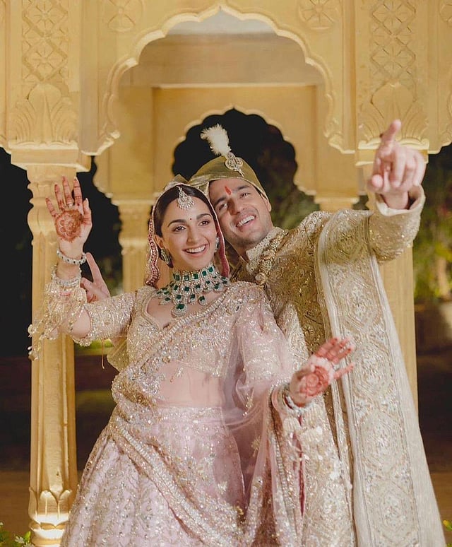 Kiara and Sidharth strike a true blue filmi pose on their wedding day. (Photo | Instagram)