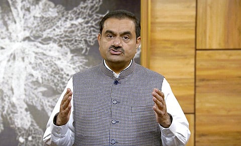 Indian billionaire Gautam Adani addressing investors. (Photo | AP)