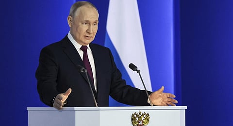 Russian President Vladimir Putin gestures as he gives his annual state of the nation address in Moscow, Russia, Tuesday, Feb. 21, 2023.(Photo | AP)