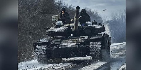 Ukrainian soldiers ride atop a tank in the frontline in Bakhmut, Donetsk region, Ukraine, Monday, Feb. 20, 2023. (Photo | AP)