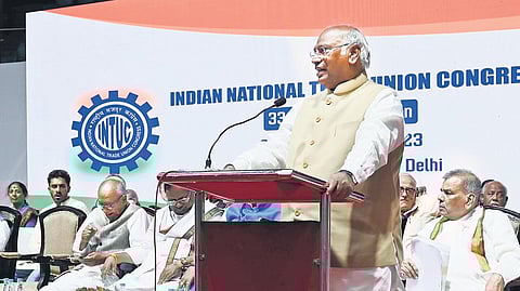 Congress president Mallikarjun Kharge addresses the 33rd plenary session of INTUC, in New Delhi on Wednesday. (Photo | Shekhar Yadav, EPS)