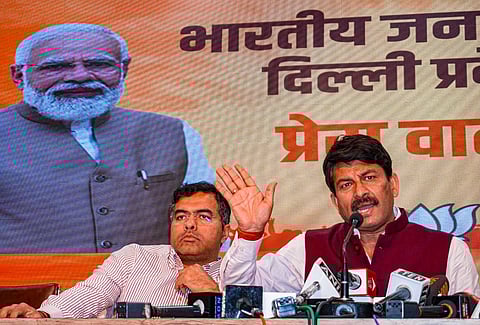 Bharatiya Janata Party MPs Manoj Tiwari and Parvesh Verma address a press conference in New Delhi, on Feb. 23, 2023. (Photo | PTI)