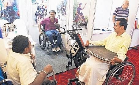 Visitors at a stall during an awareness conference on assistive technology for the specially-abled, organised by Samarthanam Seva Sansthanam on Thursday | Express