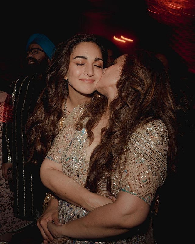 Kiara receives a kiss from her mother Genevieve.  (Photo | Kiara Advani Instagram)