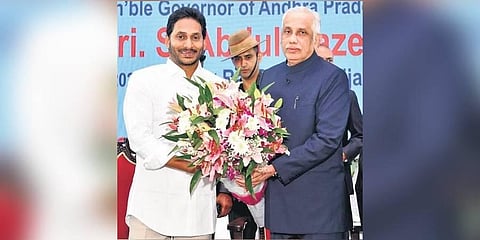 Chief Minister YS Jagan Mohan Reddy greets  Justice (Retd) S Abdul Nazeer at swearing-in ceremony I Express