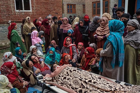 Family members mourn after Sanjay Sharma, a Kashmiri Pandit, was shot dead by terrorists in the Achan area of Pulwama district, Sunday, Feb. 26, 2023. (Photo | PTI)
