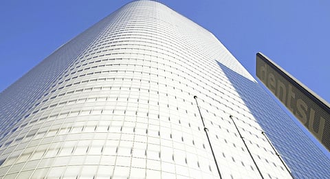 This shows a building which houses Japanese advertising giant Dentsu in Tokyo. (Photo | AP)
