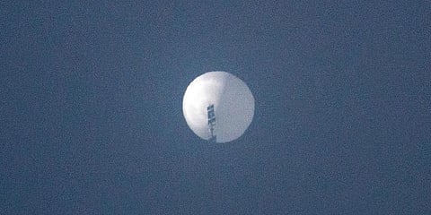 This handout photo from Chase Doak taken on February 1, 2023 and released on February 2 shows a suspected Chinese spy balloon in the sky over Billings, Montana. (Photo | AFP)