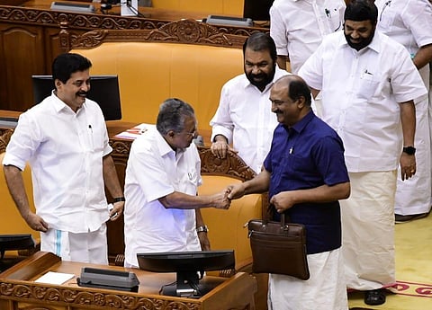 Kerala Finance Minister K N  Balagopal having a chat with Chief Minister Pinarayi Vijayan at the Assembly before his budget presentation. (Photo | Deepu BP, EPS)