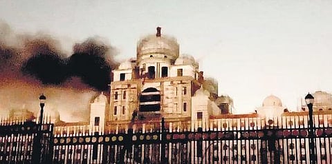 ​  Smoke billows out of the new State Secretariat building in Hyderabad on Friday  ​