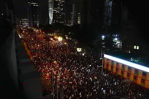 Israelis protest against the plans by Prime Minister Benjamin Netanyahu's new government to overhaul the judicial system, in Tel Aviv, Israel. (Photo | AP)