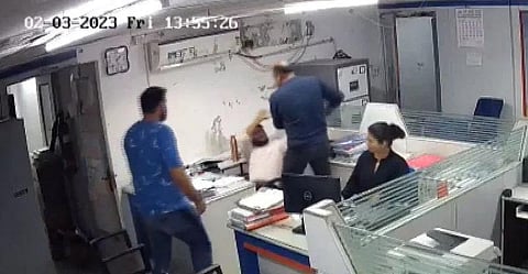 Two men assaulted an employee at Bank of India's (BOI) Nadiad branch.