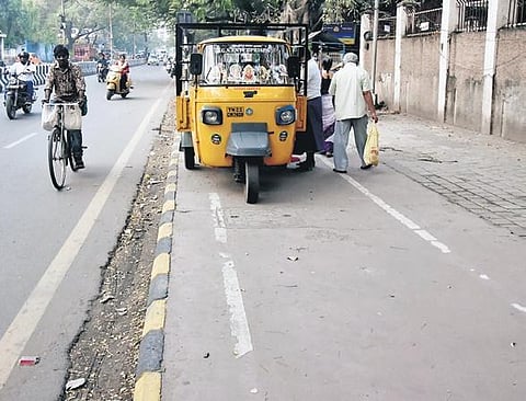 While most parts of the cycle track were in usable condition, parked vehicles made it impossible for cyclists to use the stretch uninterrupted. (Photo | P Jawahar, EPS)