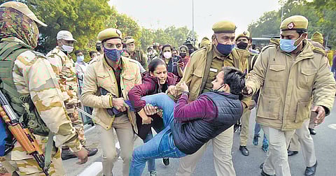 In this image dated December 2021, police remove doctors protesting in New Delhi against the delay in NEET PG counselling. (Photo | EPS, Parveen Negi)