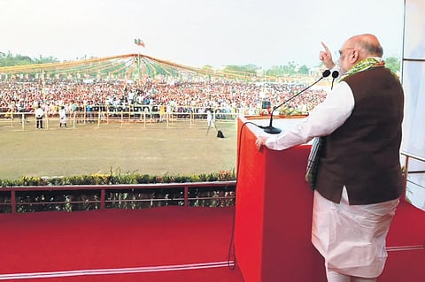 Union Home Minister Amit Shah during a public meeting for the upcoming Tripura Assembly elections, at Santirbazar in South Tripura district on Monday. (Photo | PIB)