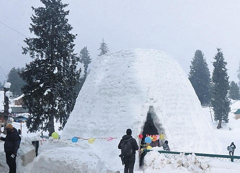 A glass igloo restaurant amidst the snow-covered slopes in Gulmarg has become a favourite spot for tourists. (Photo | Zahoor Punjabi)