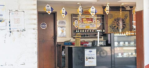 QR Code placed in front of a shop at Thillai nagar 11th cross in Tiruchy | M K ASHOK KUMAR