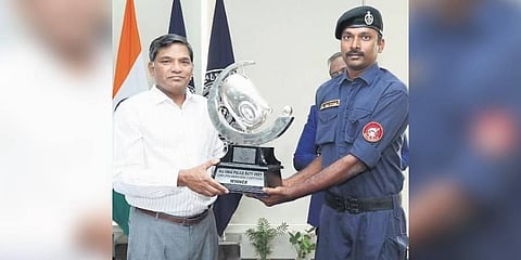 DGP Kasireddy Rajendranath Reddy handing over the prize to one of the winners on Tuesday I Express