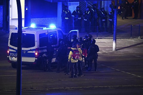 Armed police officers near the scene of a shooting in Hamburg, Germany on Thursday March 9, 2023 after one or more people opened fire in a church.  (Photo | AP)