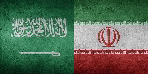 A collage featuring the flags of Saudi Arabia and Iran used for representative purposes only.
