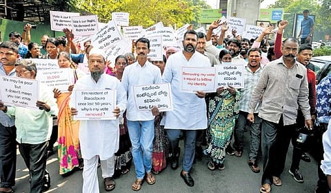 BRS leaders and local residents stage a dharna on Friday