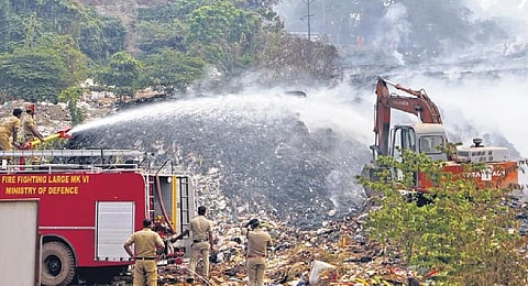 Fire and Rescue Services personnel trying to douse the fire at the Brahmapuram waste treatment plant | File Pic.