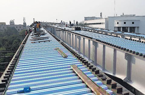 Workers set up the steel bridge in Hyderabad on Sunday | Vinay Madapu