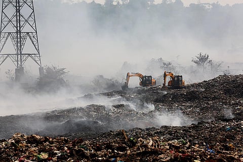 Smoke billows from the waste dumped at Brahmapuram. (Photo | T P Sooraj, EPS)