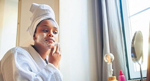Use a face pack according to your skin type; (below) soak yourself in a tub of warm water to relax. (File Photo)