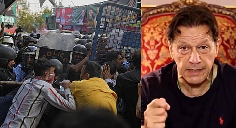 Pakistan riot police on Tuesday used water cannon and tear gas to push back supporters of former prime minister Imran Khan who had gathered outside his house to prevent officers from arresting him. (Photo | AP)