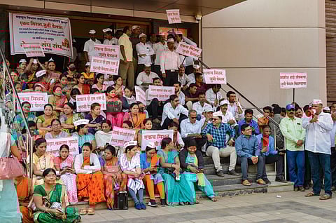 Maharashtra Government employees stage a protest demanding restoration of the old pension scheme, in Karad, Wednesday, March 15, 2023. (Photo | PTI)