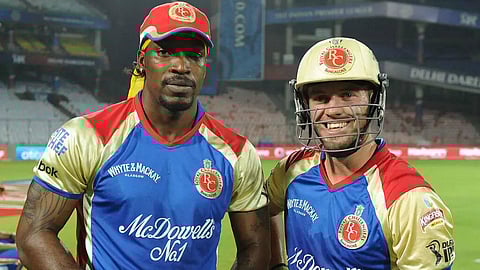 RCB will retire the jersey numbers worn by AB de Villiers and Chris Gayle when the two cricketing legends are inducted into the IPL side's Hall of Fame on March 26. (Photo | BCCI website)