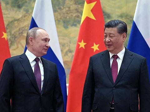 Russian President Vladimir Putin and Chinese President Xi Jinping pose for a photograph during their meeting in Beijing, on Feb. 4, 2022. (File Photo | AFP)